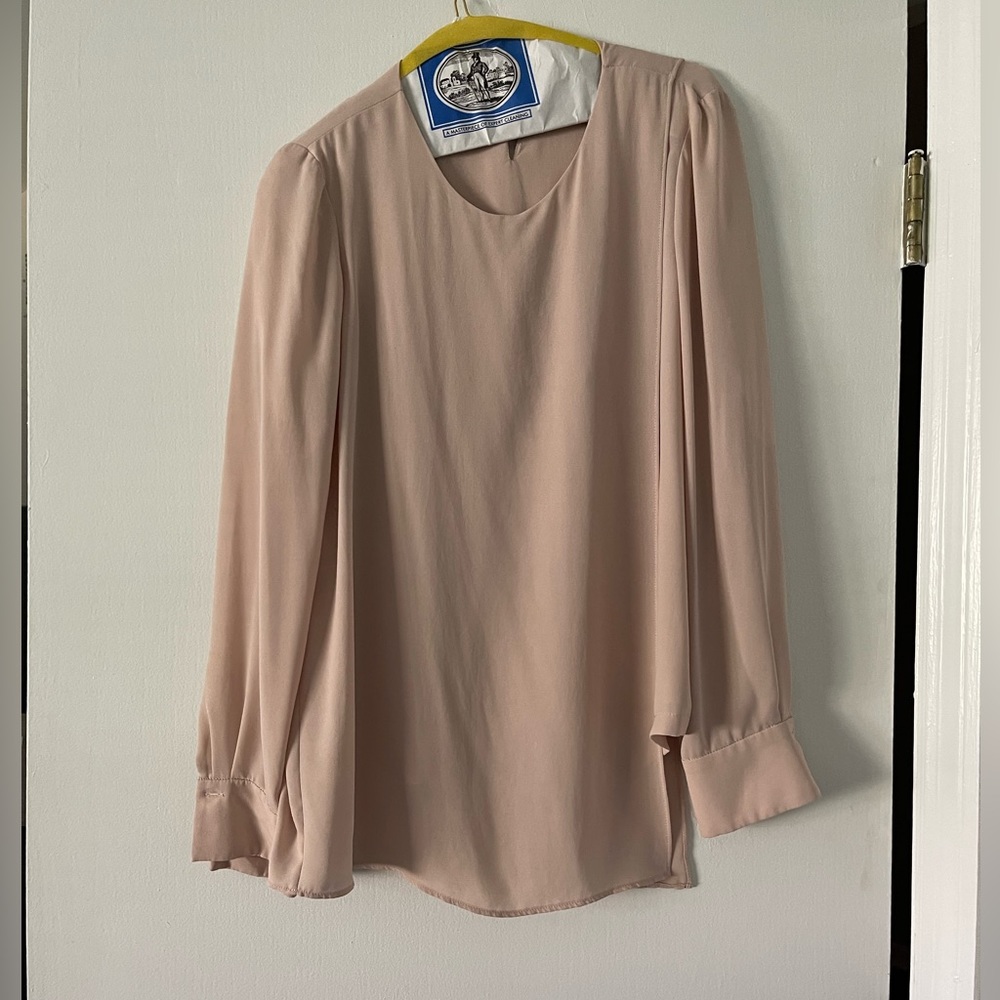 Nude/ light bare pink, asymmetrical BCBG blouse.